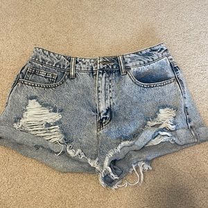 Forever 21 size 28 ripped jeans